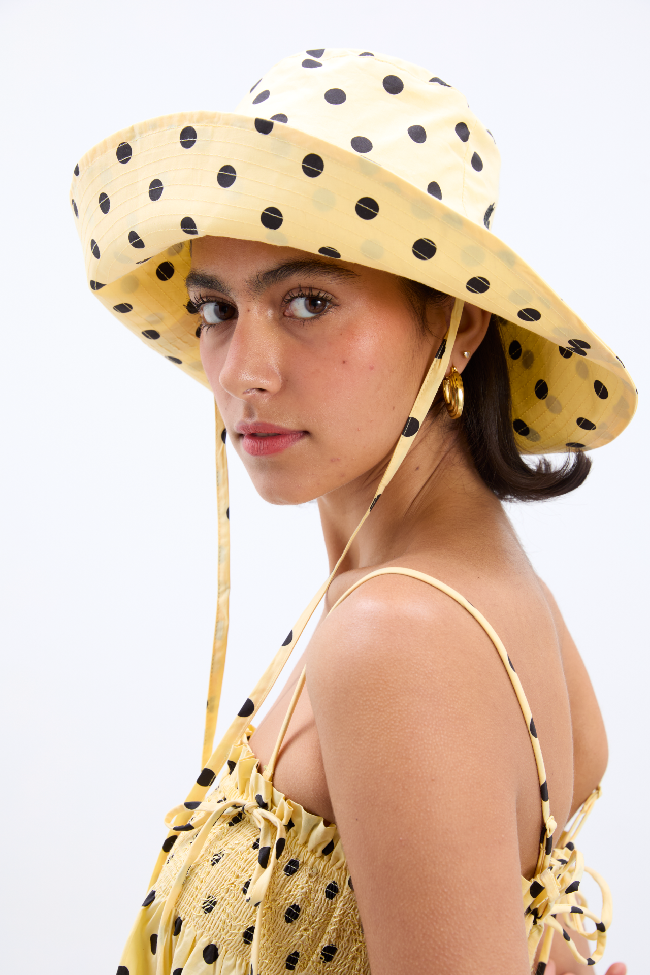 sunhat in butter yellow & black polka dot