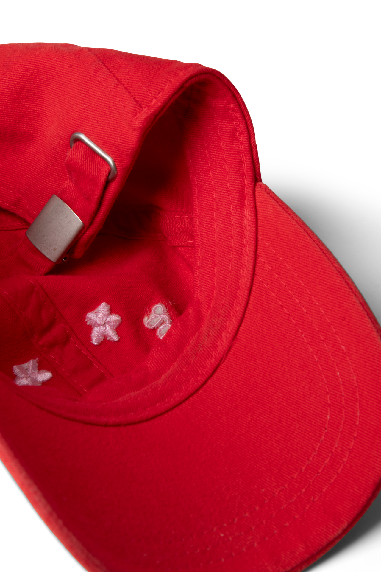 washed smiley cap in red with pink embroidery