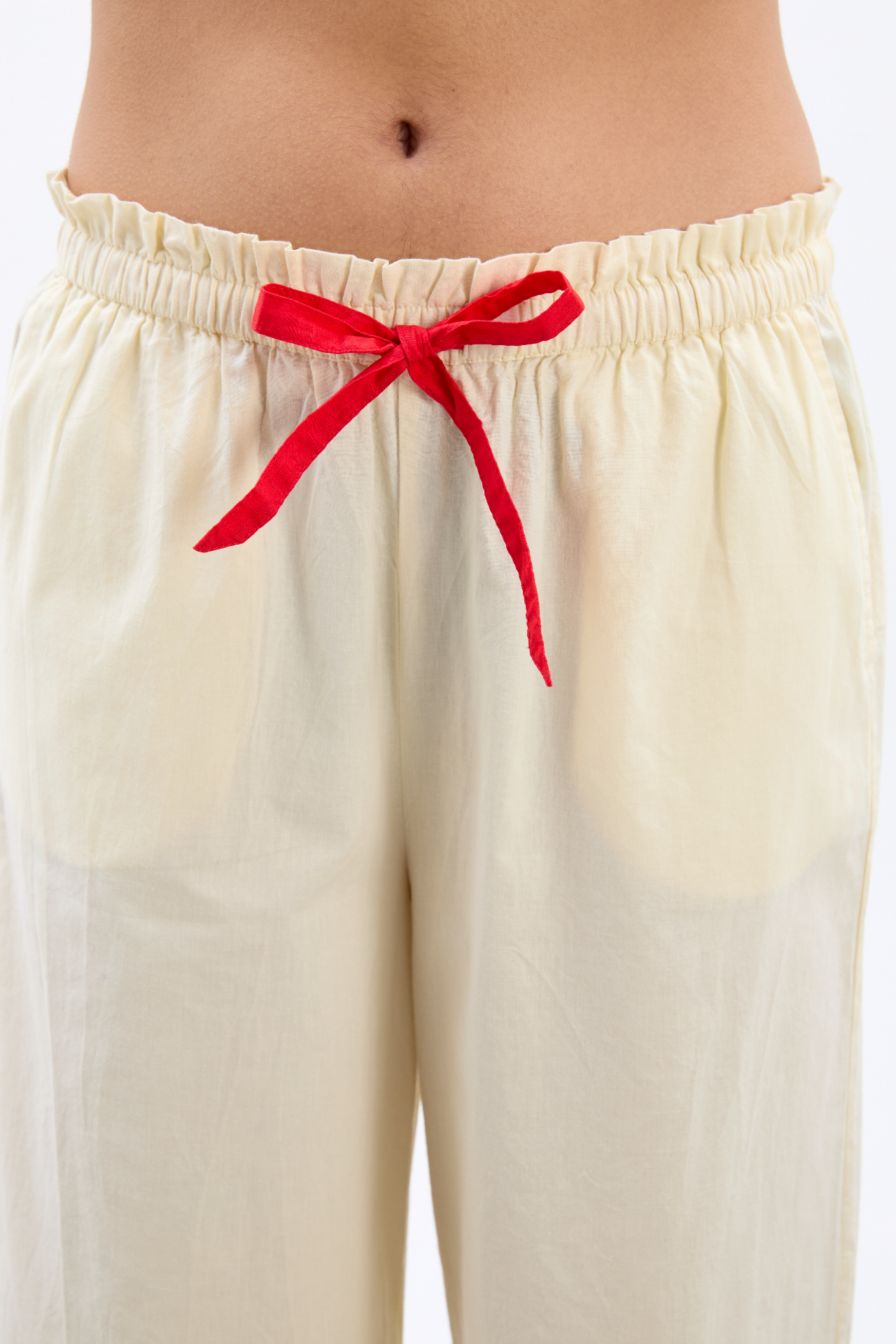 tula frilly hem trouser - butter/red