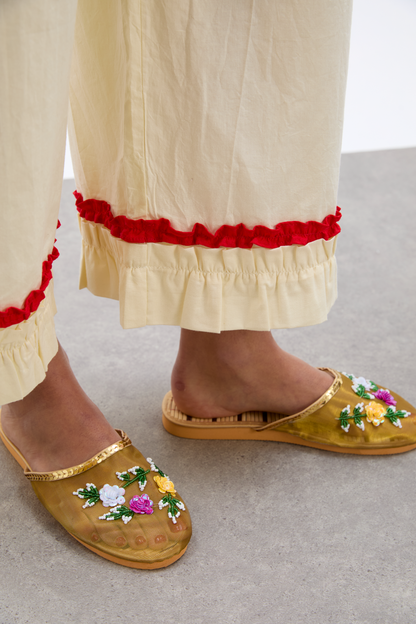 tula frilly hem trouser - butter/red